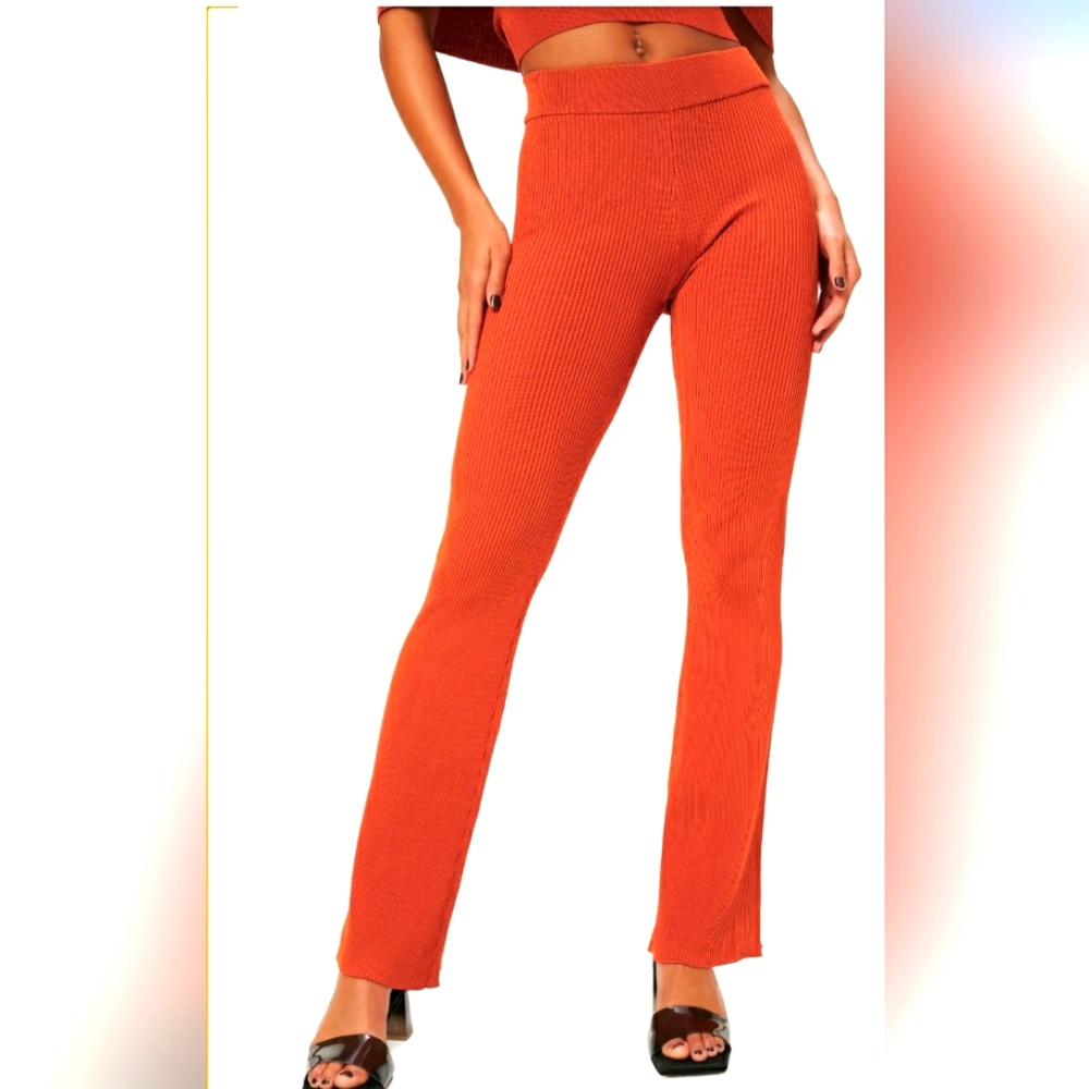 Good American High Waist Orange ribbed Flare pants.